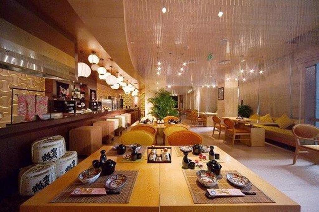 New Century Grand Hotel كايفنغ المظهر الخارجي الصورة